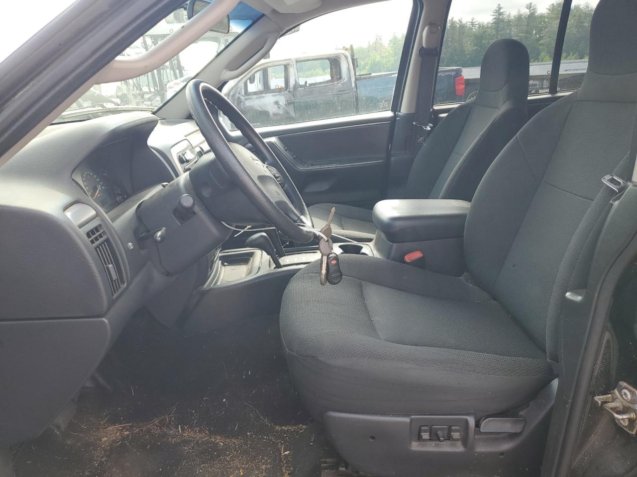 2003 Jeep Grand Cherokee Laredo VIN: 1J4GW48S33C542409 Lot: 57889304