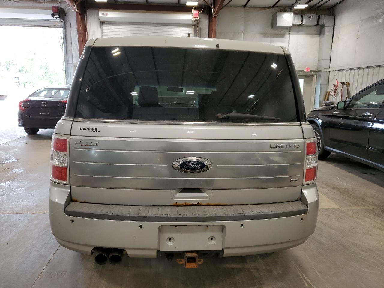 2009 Ford Flex Limited VIN: 2FMEK63C09BA15436 Lot: 57885544