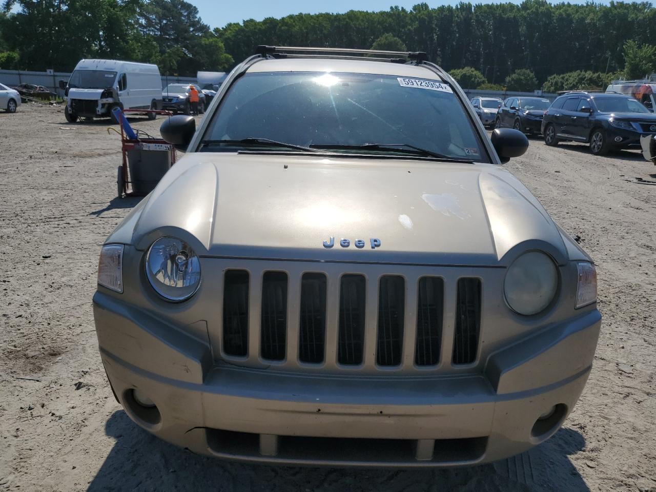 2010 Jeep Compass Sport VIN: 1J4NT4FB2AD585357 Lot: 59123954