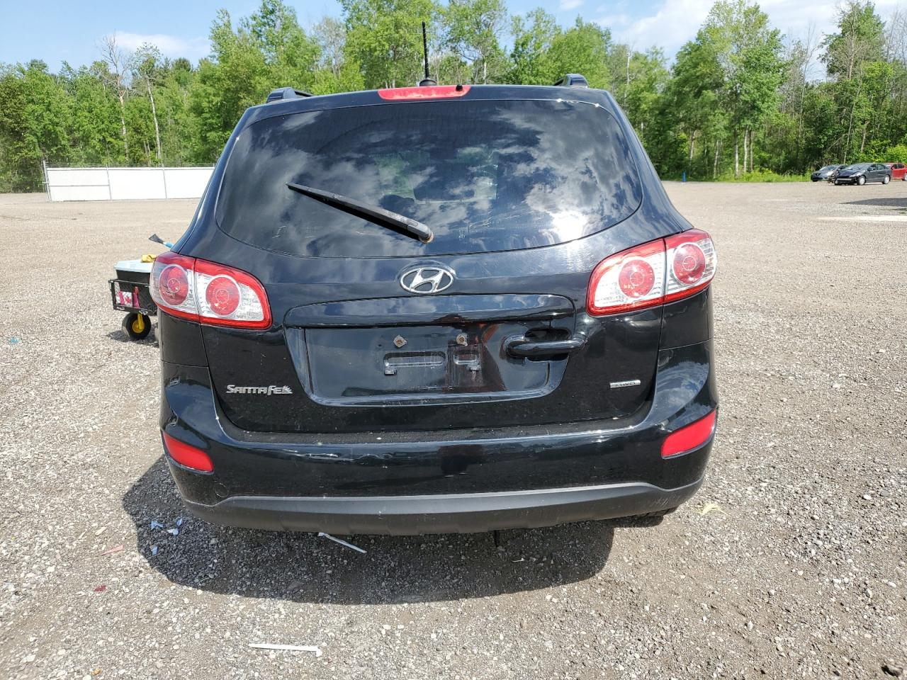 2012 Hyundai Santa Fe Gls VIN: 5XYZGDAB4CG138181 Lot: 59055234