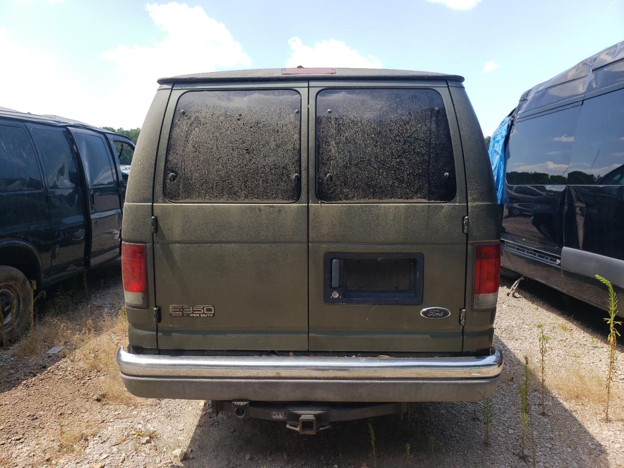 2004 Ford Econoline E350 Super Duty Wagon VIN: 1FBSS31L14HB08779 Lot: 59170344