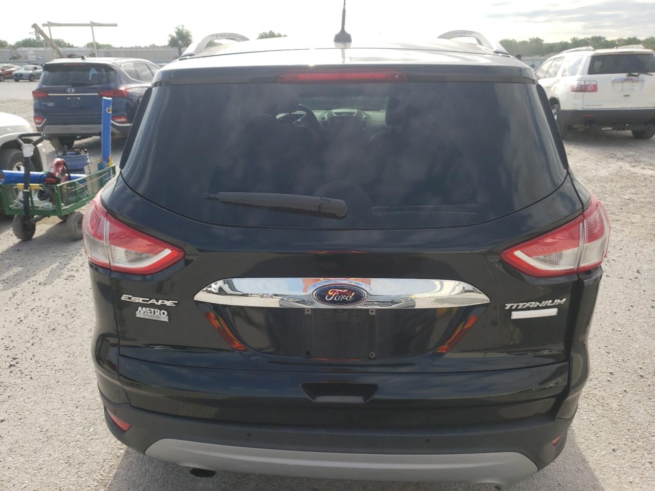 2016 Ford Escape Titanium VIN: 1FMCU0JX1GUA83580 Lot: 59119834