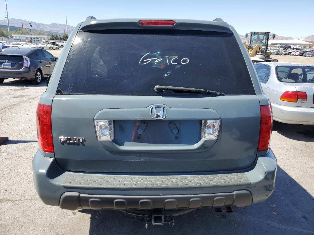 2005 Honda Pilot Exl VIN: 2HKYF18785H557970 Lot: 58863384