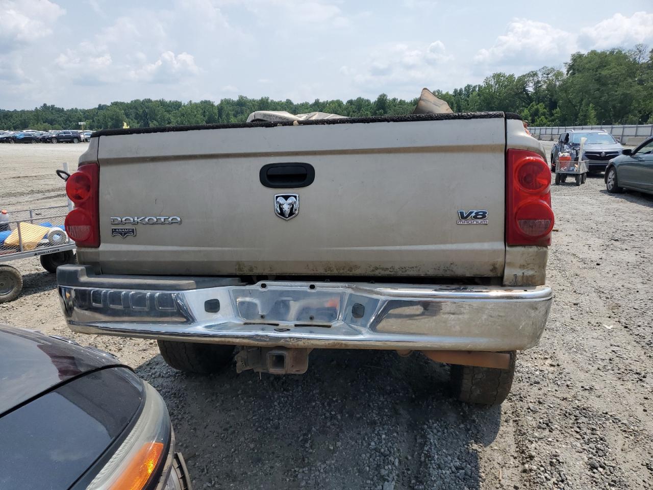 2005 Dodge Dakota Quad Laramie VIN: 1D7HW58N15S145340 Lot: 58954154
