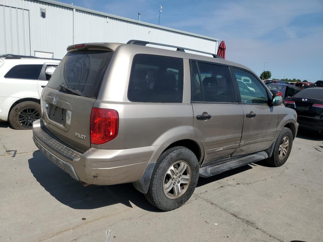 2004 Honda Pilot Exl VIN: 2HKYF18694H596461 Lot: 59002574