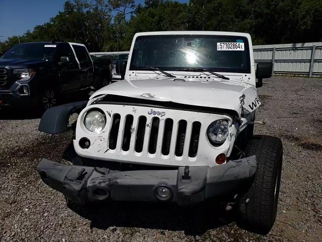 2013 Jeep Wrangler Sport VIN: 1C4AJWAGXDL657375 Lot: 57302864