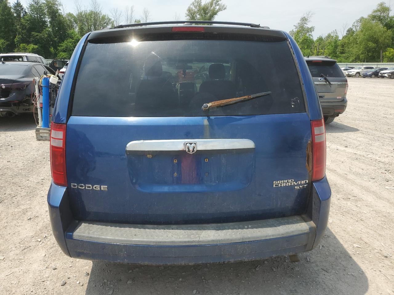2010 Dodge Grand Caravan Sxt VIN: 2D4RN5D19AR129261 Lot: 59735554