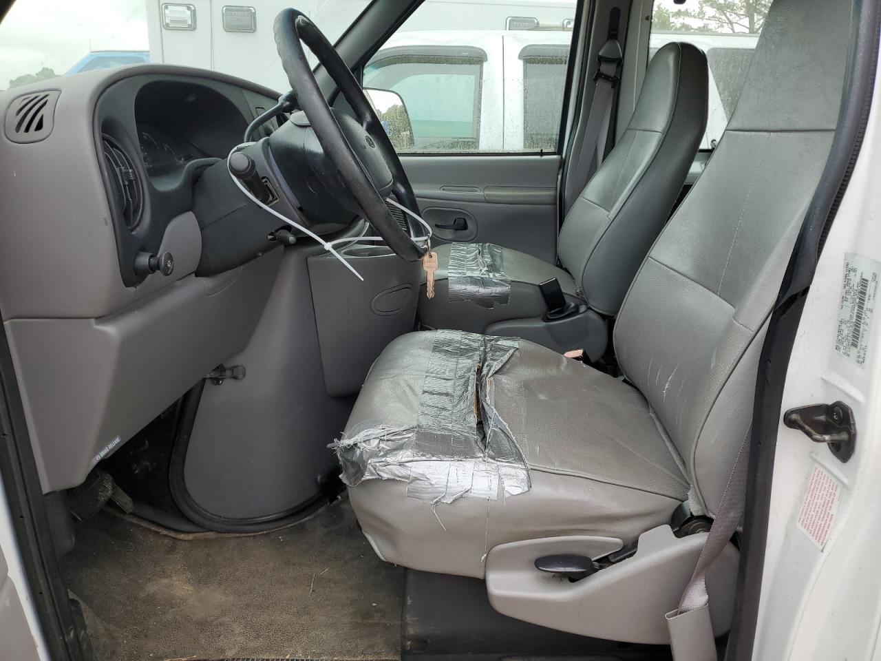 1999 Ford Econoline E350 Super Duty Wagon VIN: 1FBSS31L2XHB37325 Lot: 56878054