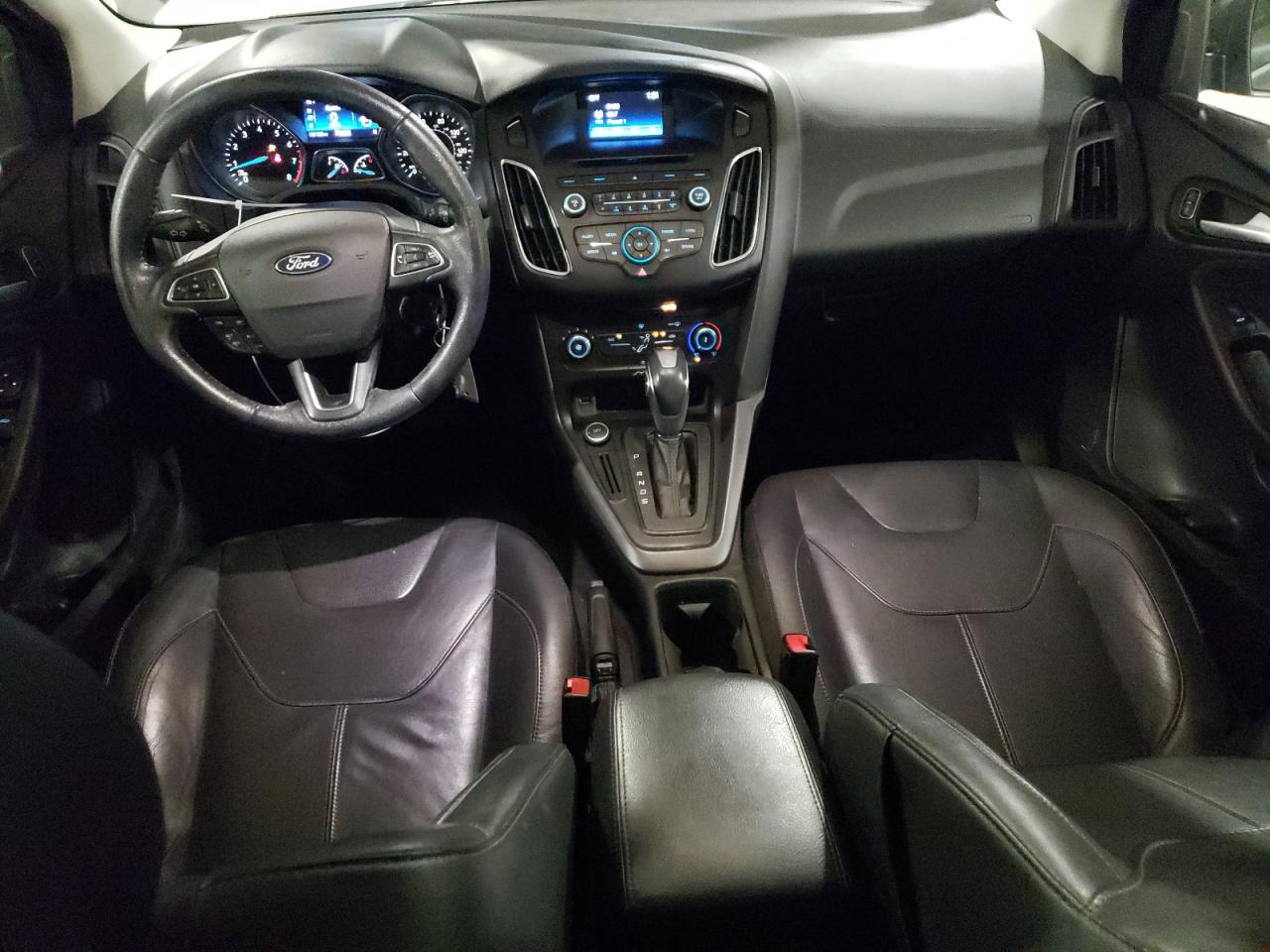 2015 Ford Focus Se VIN: 1FADP3F29FL217891 Lot: 59153634