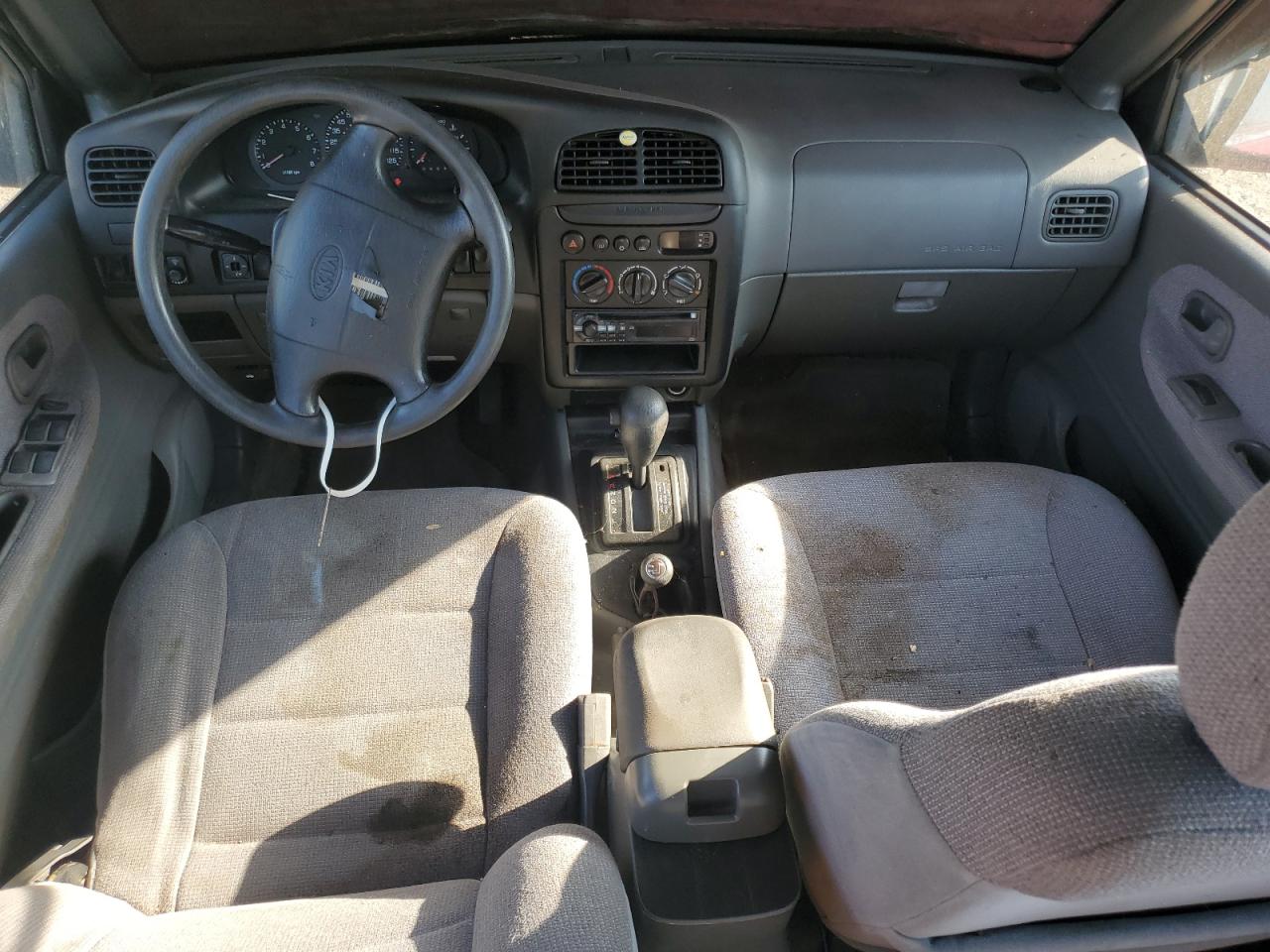 1999 Kia Sportage VIN: KNDJA7237X5597517 Lot: 82673504