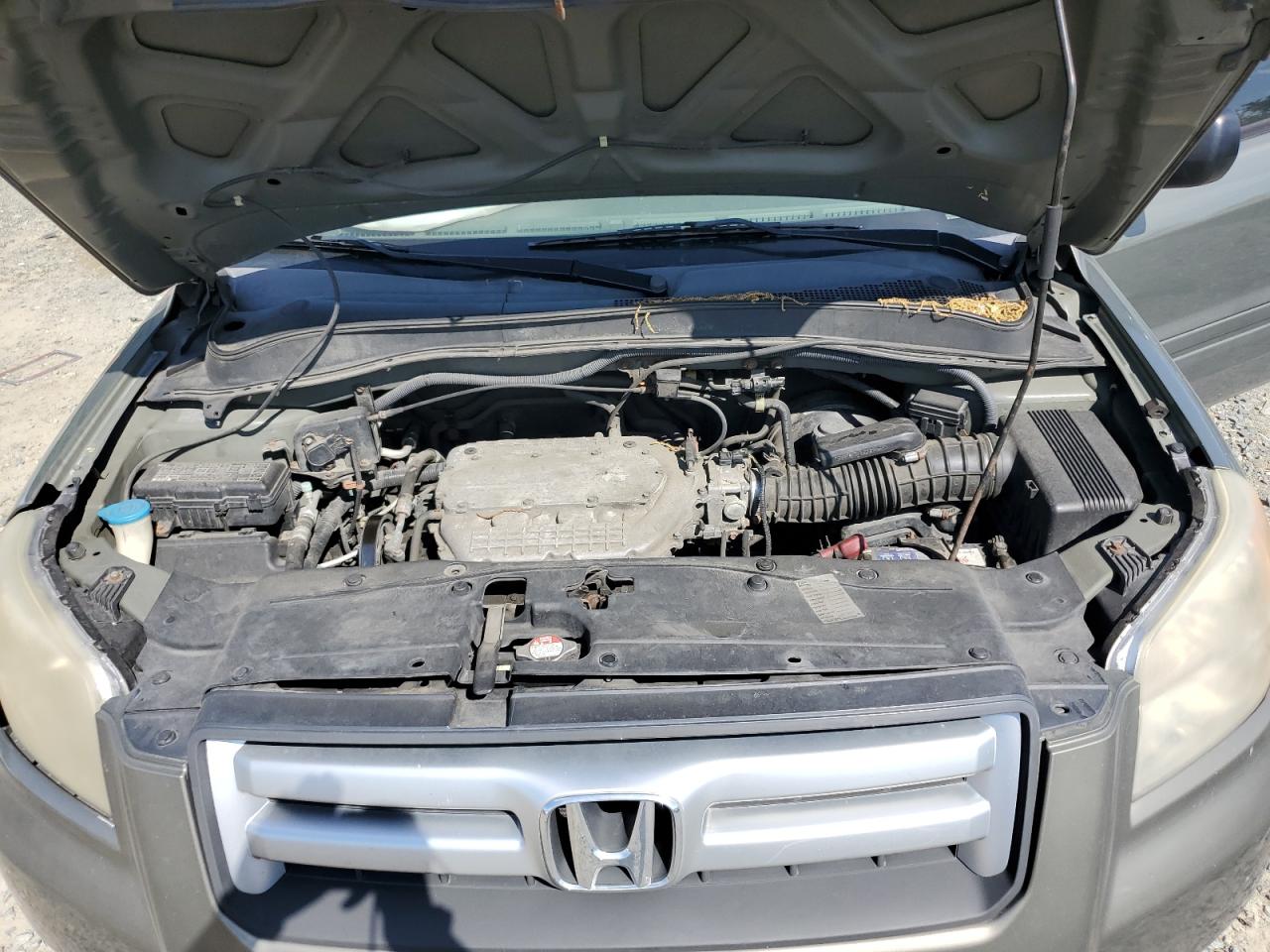 2007 Honda Pilot Lx VIN: 5FNYF18137B029699 Lot: 58919104