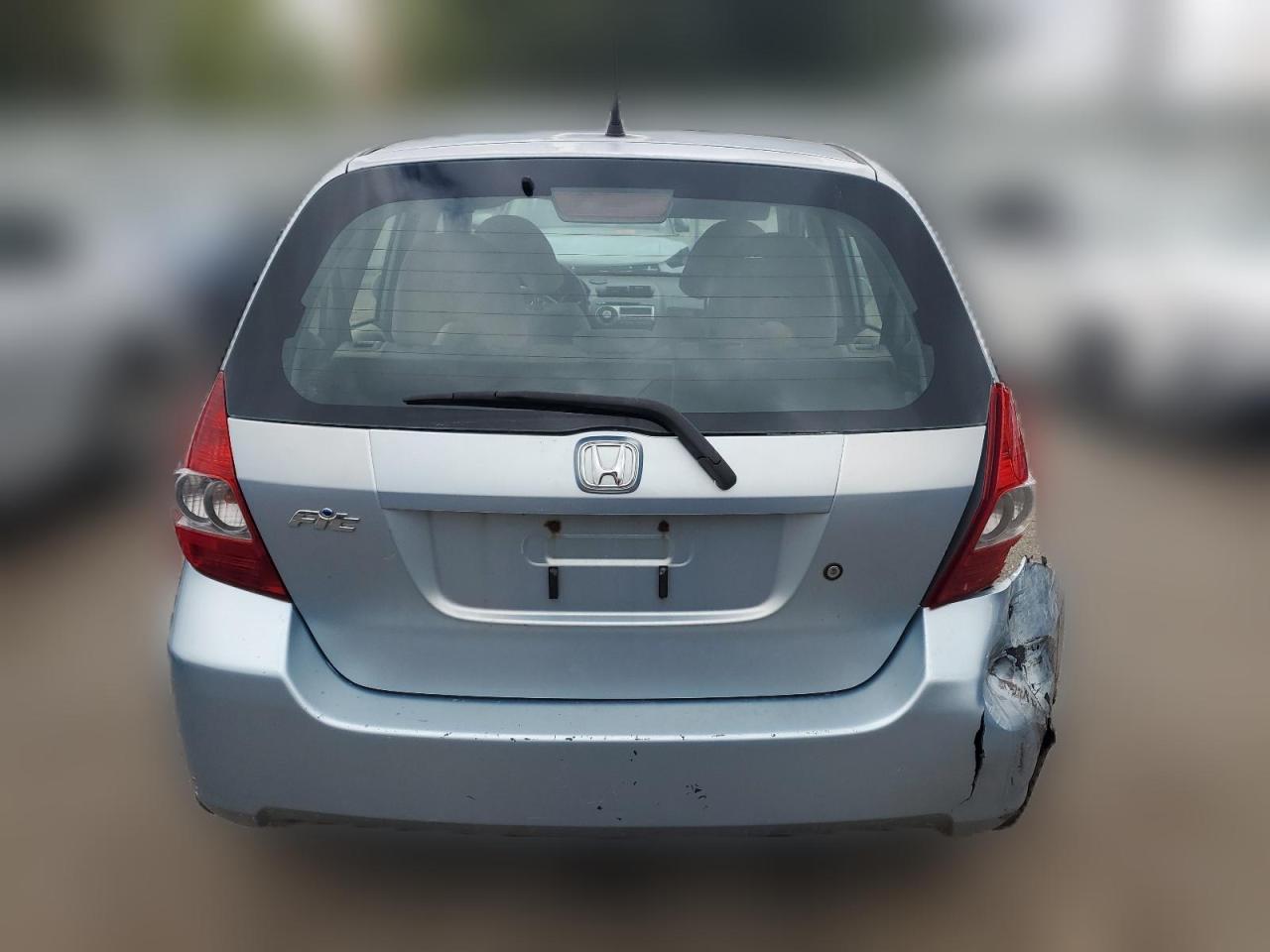 2007 Honda Fit VIN: JHMGD38497S013984 Lot: 51557214