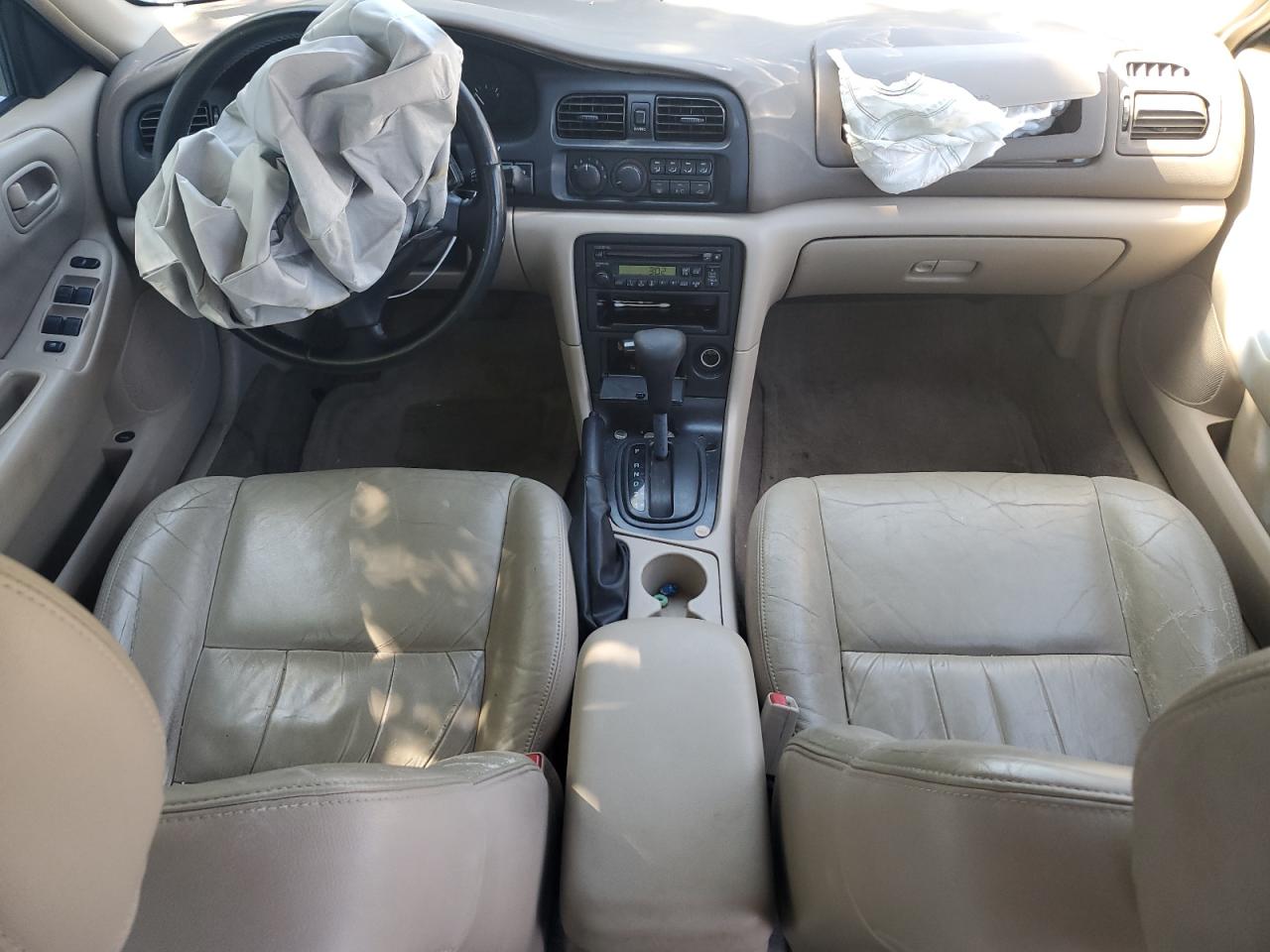 1998 Mazda 626 Dx VIN: 1YVGF22CXW5769305 Lot: 57855374