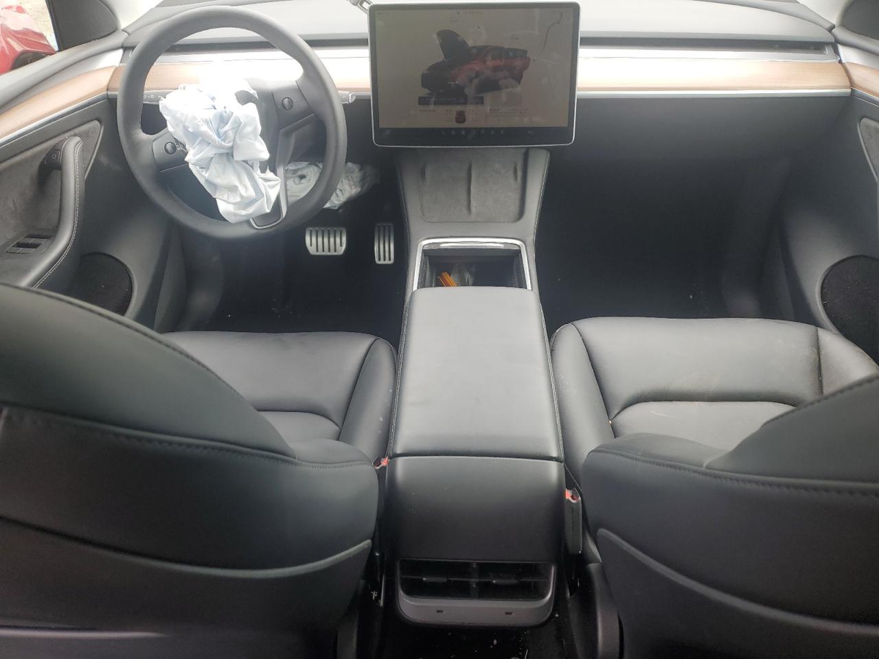 2023 Tesla Model Y VIN: 7SAYGDEF3PF750297 Lot: 58538374