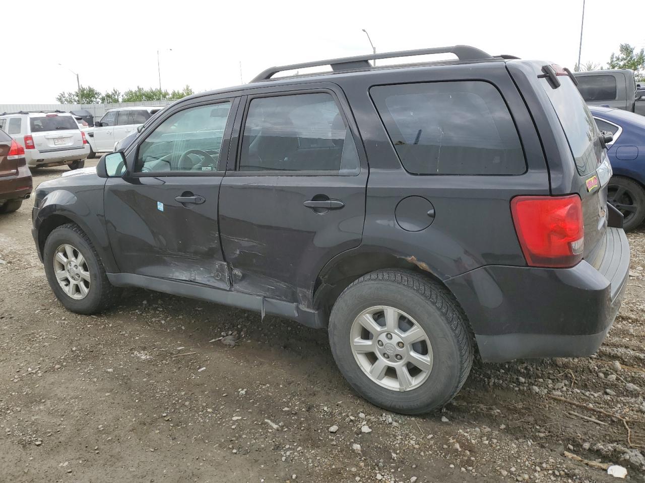 2010 Mazda Tribute I VIN: 4F2CY0C72AKM00338 Lot: 60603114