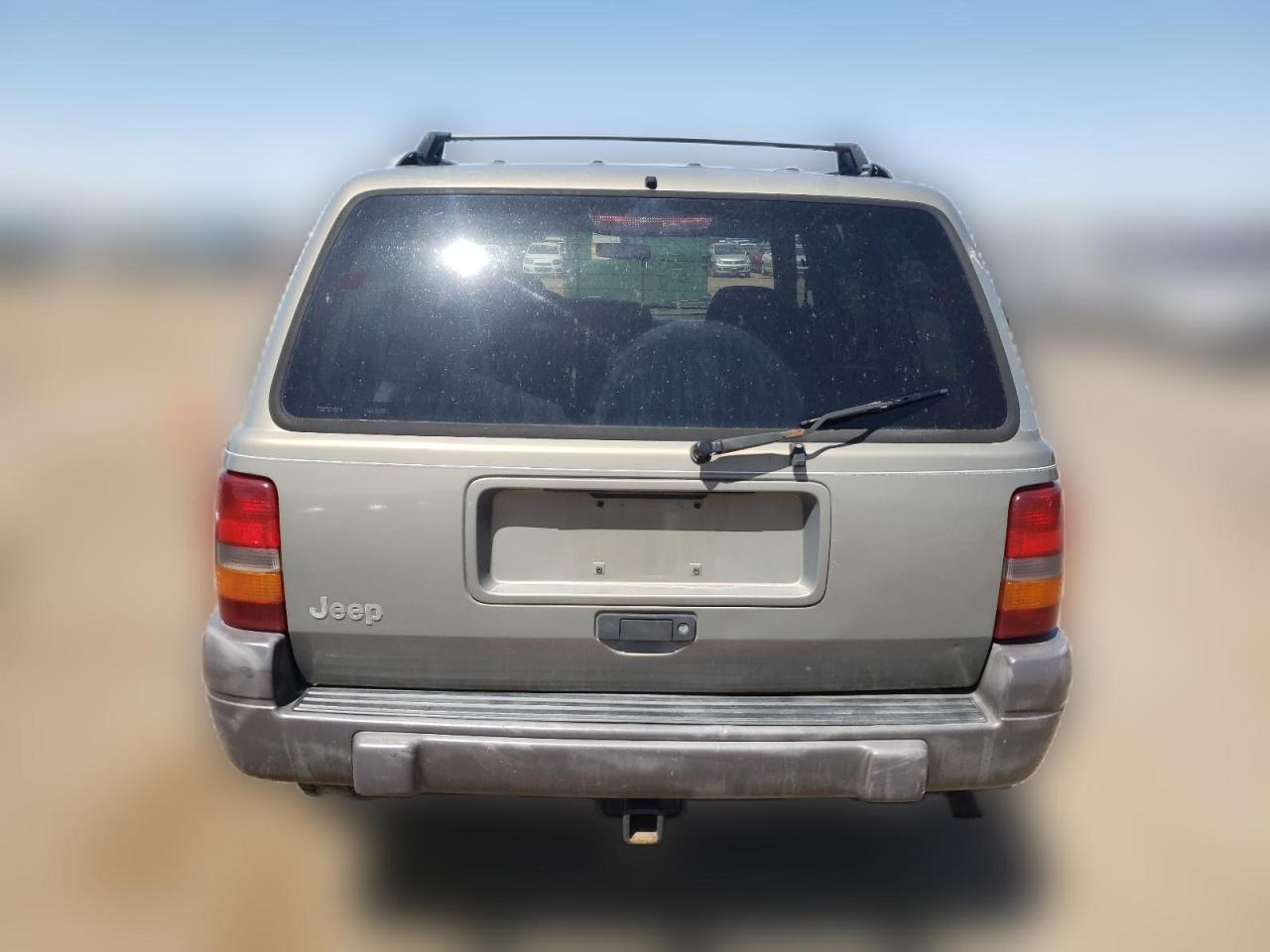 1996 Jeep Grand Cherokee Laredo VIN: 1J4EZ58SXTC146076 Lot: 58620614