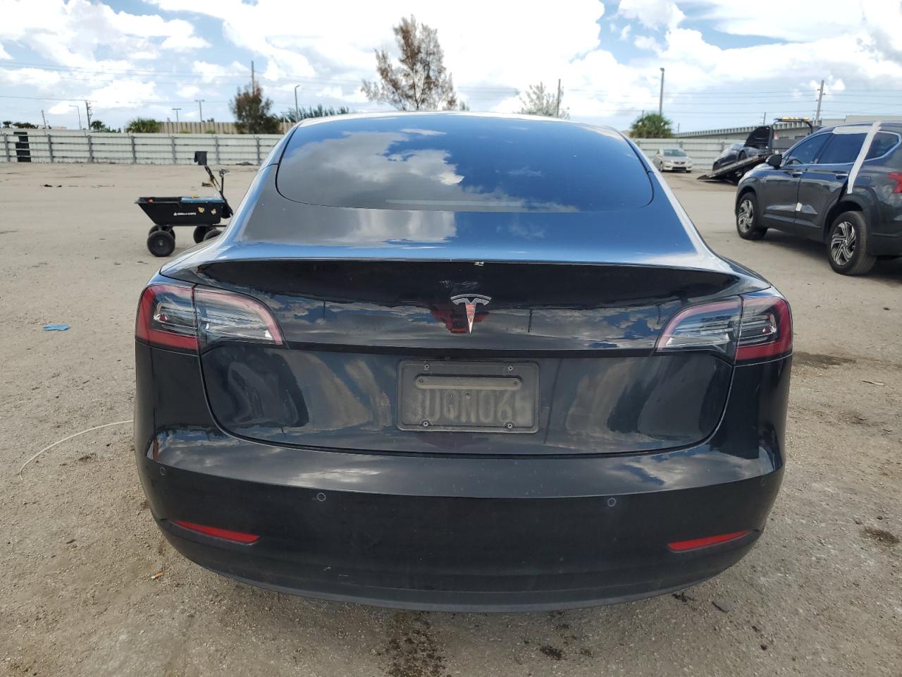 2021 Tesla Model 3 VIN: 5YJ3E1EA5MF875703 Lot: 61142684