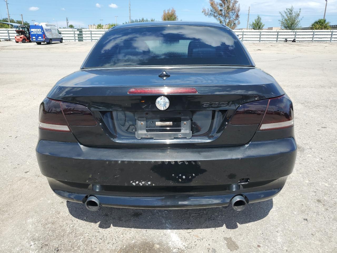 2009 BMW 335 I VIN: WBAWL735X9P180705 Lot: 61089014