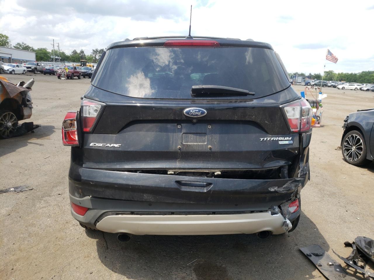 2017 Ford Escape Titanium VIN: 1FMCU9JD7HUB11877 Lot: 60658224