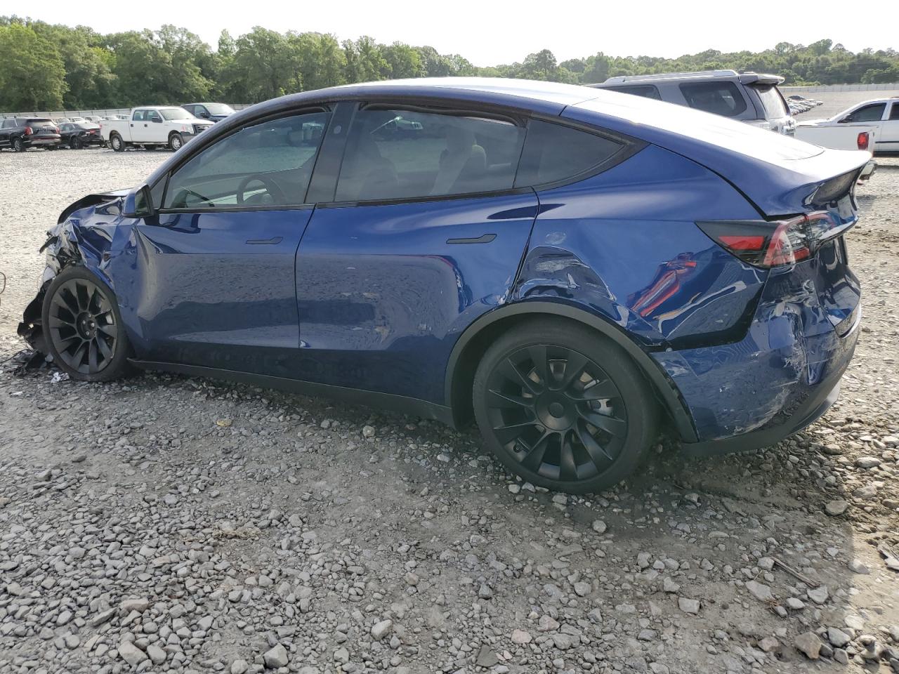 2023 Tesla Model Y VIN: 7SAYGDEE1PA140399 Lot: 59745484