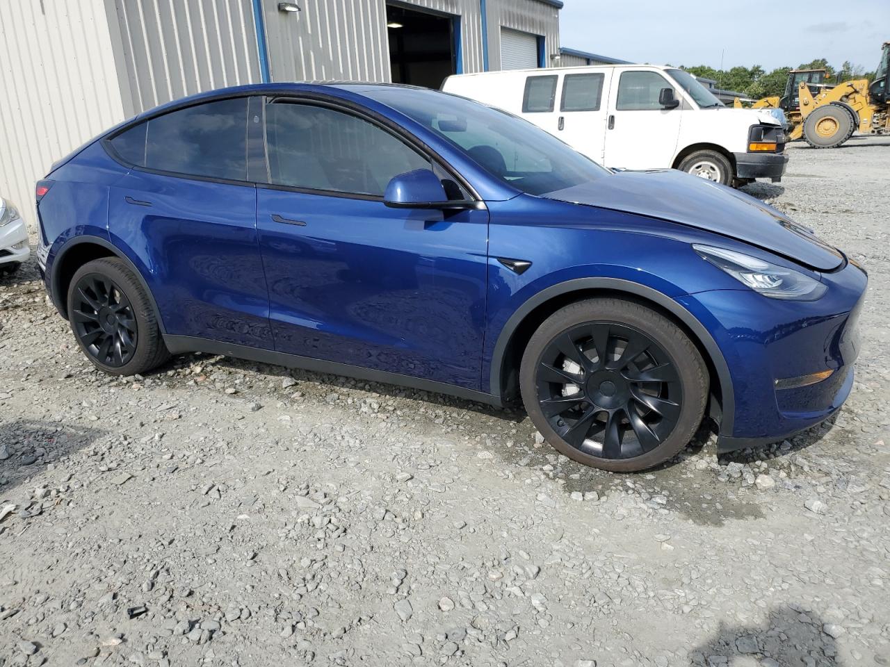 2023 Tesla Model Y VIN: 7SAYGDEE1PA140399 Lot: 59745484