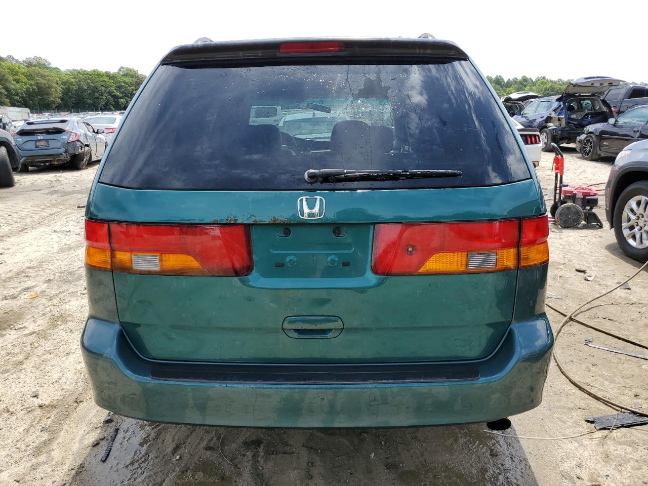 2002 Honda Odyssey Exl VIN: 2HKRL18792H576763 Lot: 60636084