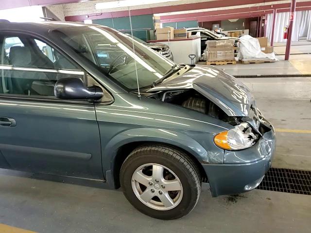 2005 Dodge Caravan Sxt VIN: 1D4GP45R25B238410 Lot: 59869134