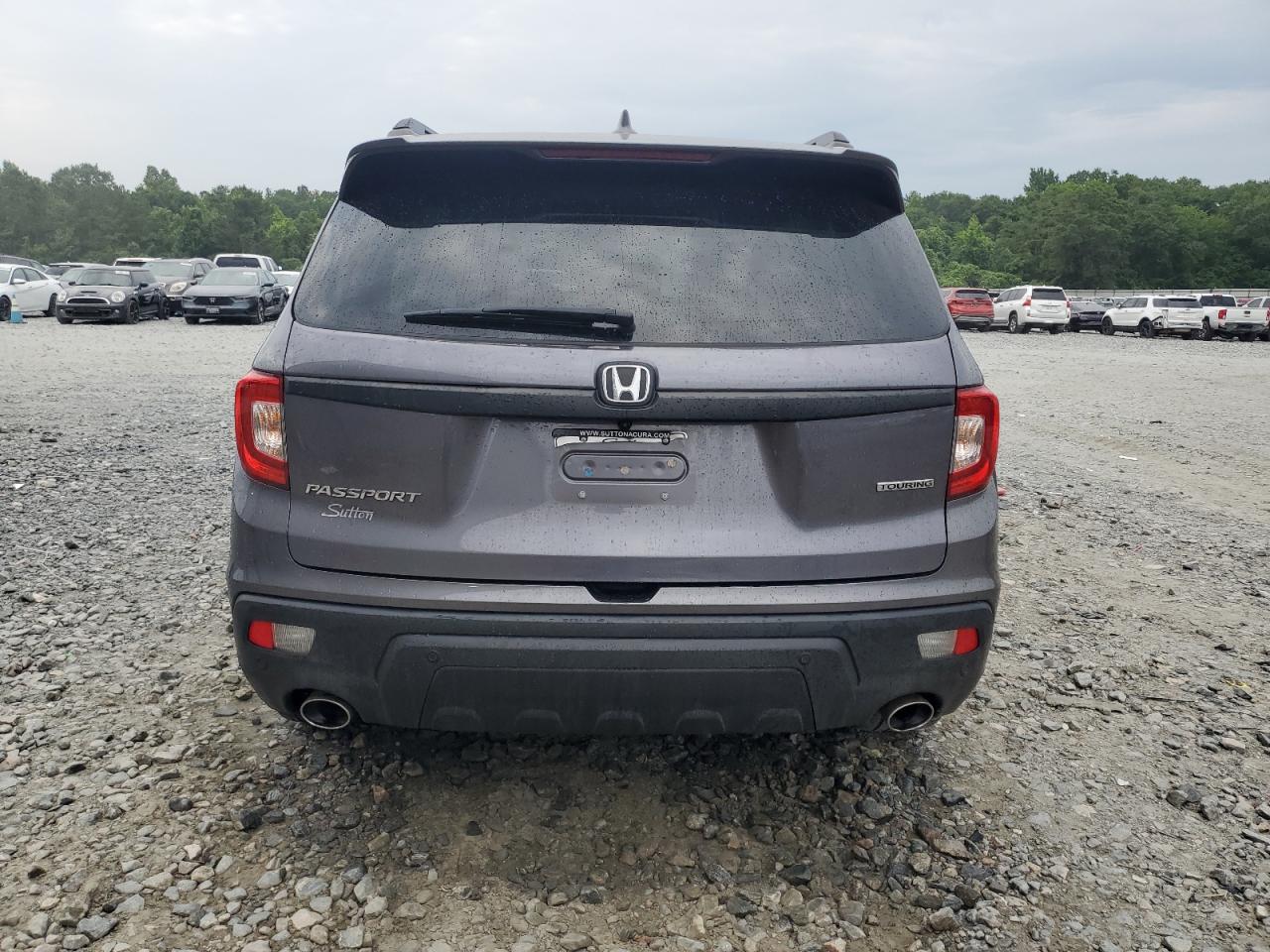 2021 Honda Passport Touring VIN: 5FNYF7H94MB005741 Lot: 57626664