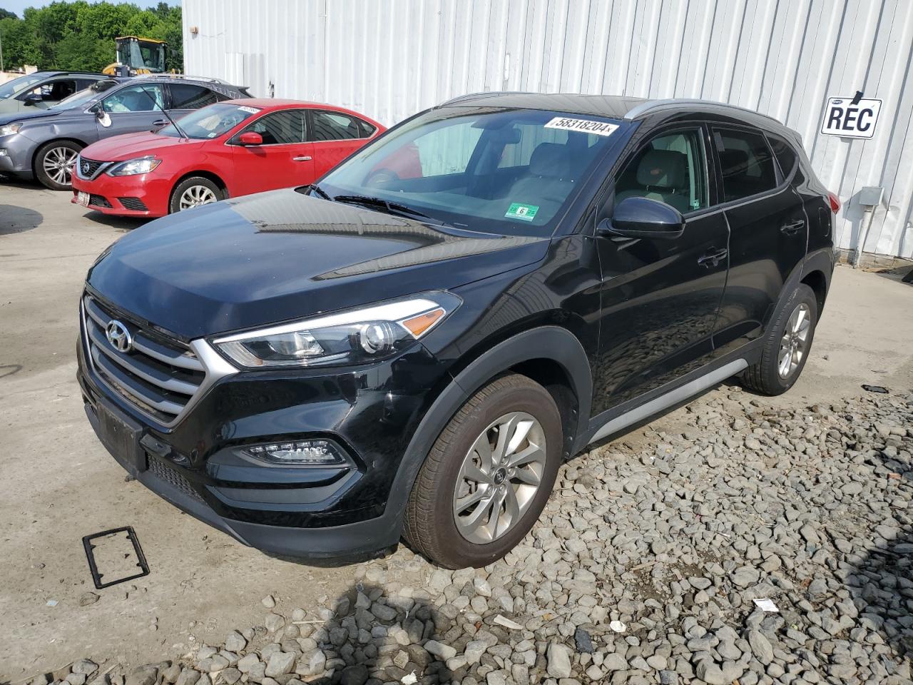 KM8J3CA42JU690645 2018 HYUNDAI TUCSON - Image 1