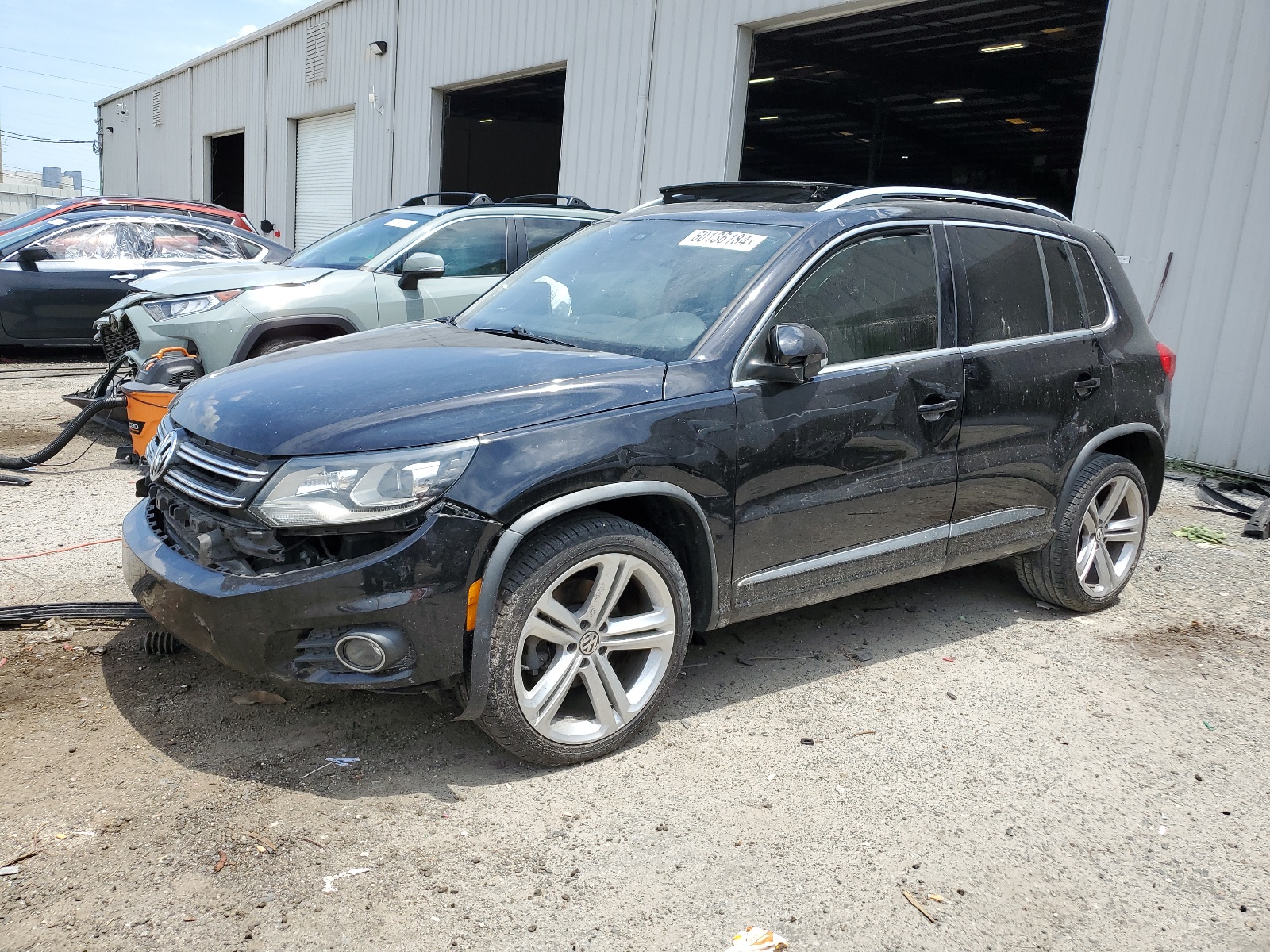 2014 Volkswagen Tiguan S vin: WVGAV3AX7EW538309