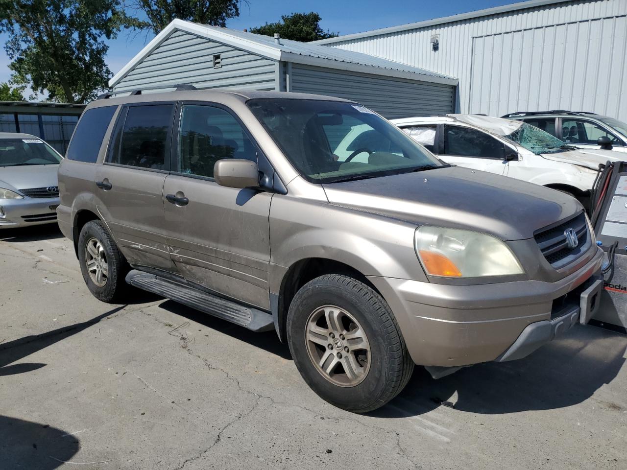 2004 Honda Pilot Exl VIN: 2HKYF18694H596461 Lot: 59002574