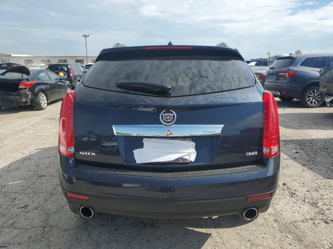 2014 Cadillac Srx Performance Collection VIN: 3GYFNCE35ES660674 Lot: 61108194