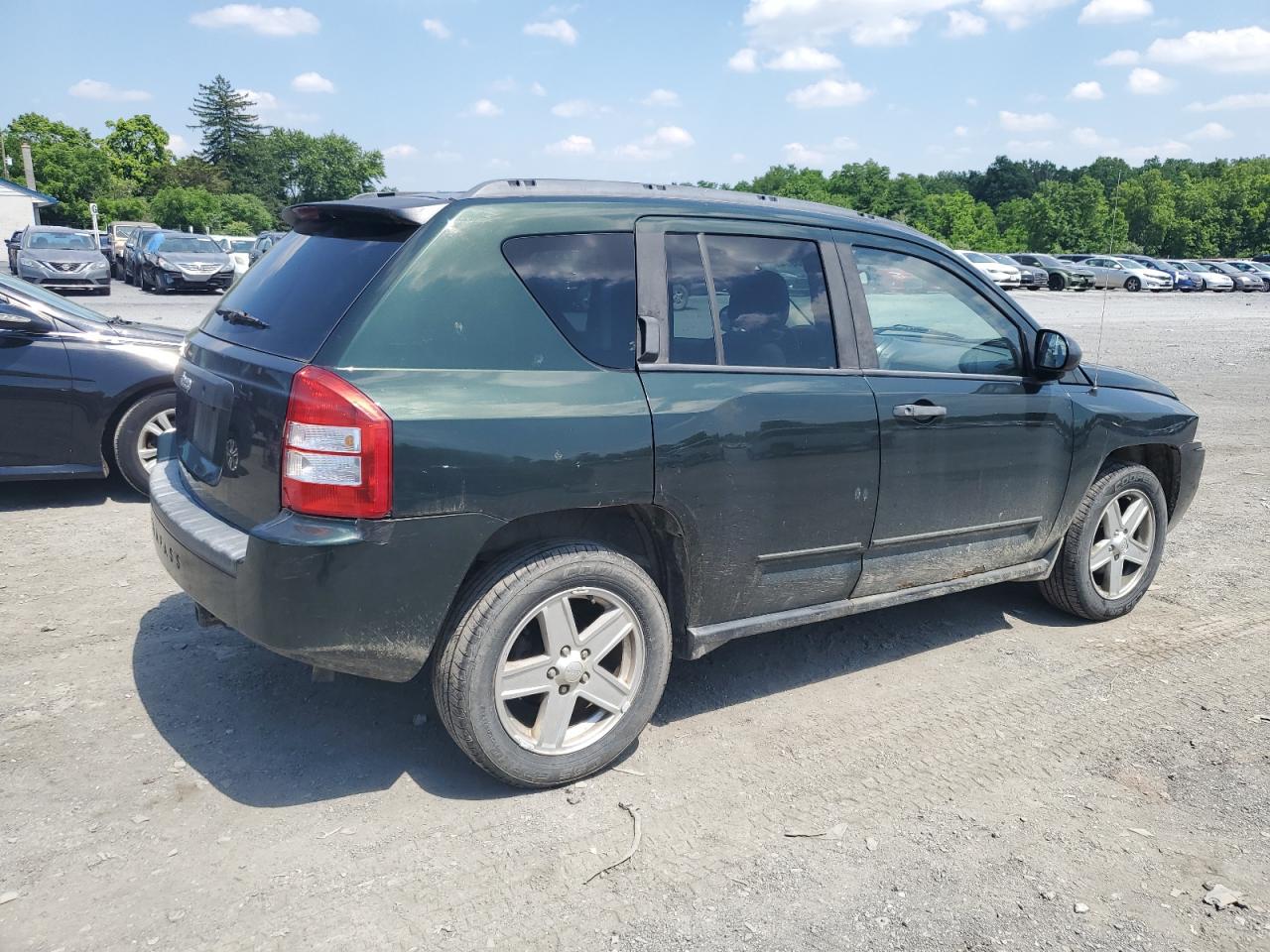 2010 Jeep Compass Sport VIN: 1J4NF1FB9AD623026 Lot: 59653974