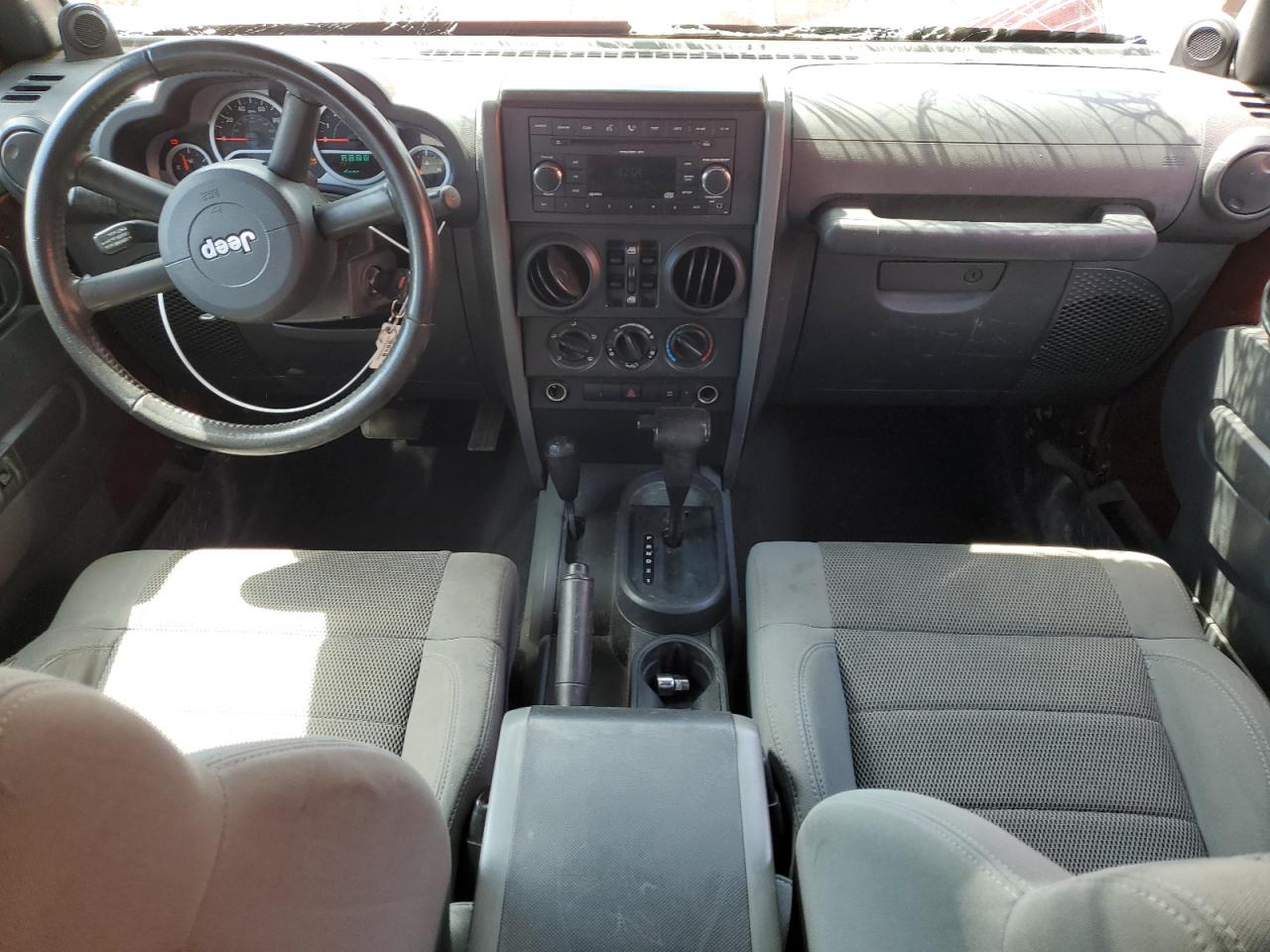 2007 Jeep Wrangler Sahara VIN: 1J8GA59147L141983 Lot: 56860054