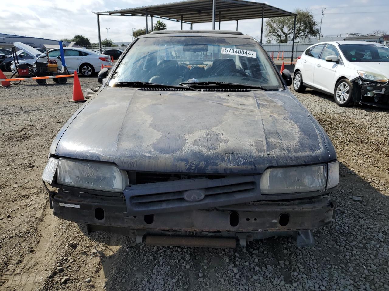 1993 Infiniti G20 VIN: JNKCP01P7PT401153 Lot: 57340044