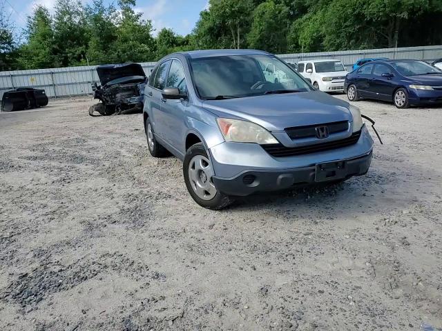 2009 Honda Cr-V Lx VIN: 3CZRE38309G706591 Lot: 60192754