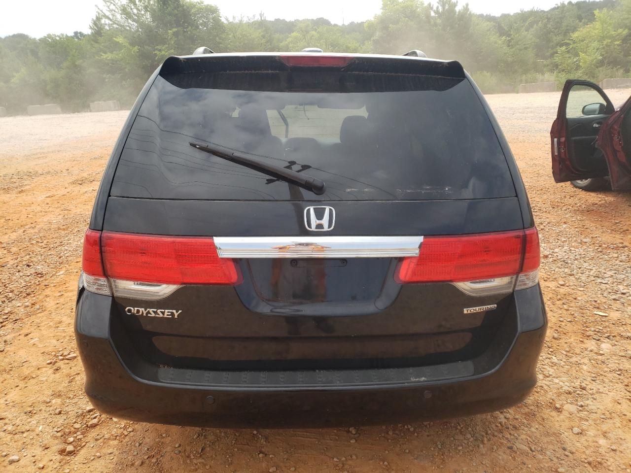 2010 Honda Odyssey Touring VIN: 5FNRL3H91AB104342 Lot: 59504294