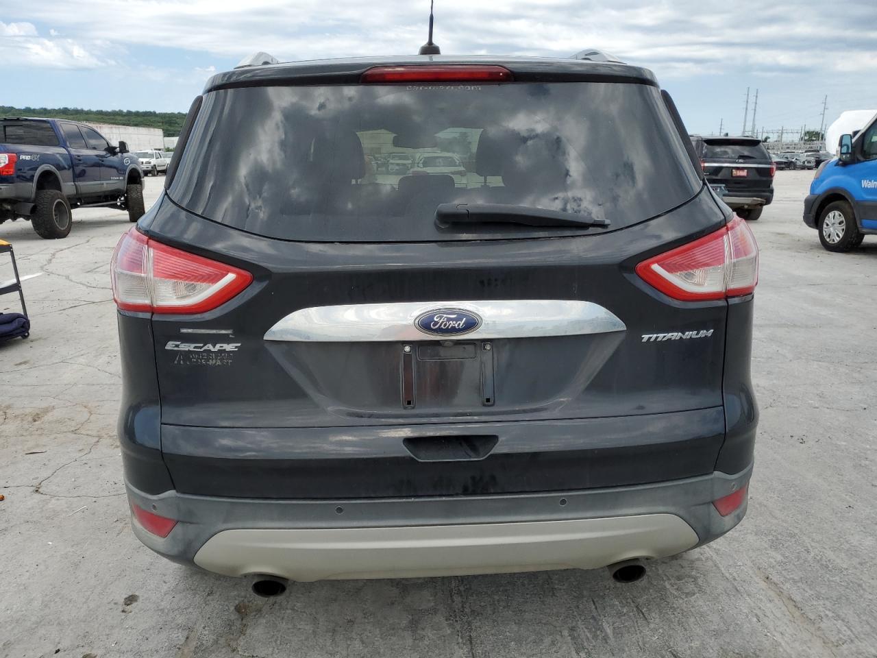 2014 Ford Escape Titanium VIN: 1FMCU0JX6EUB61168 Lot: 57889294