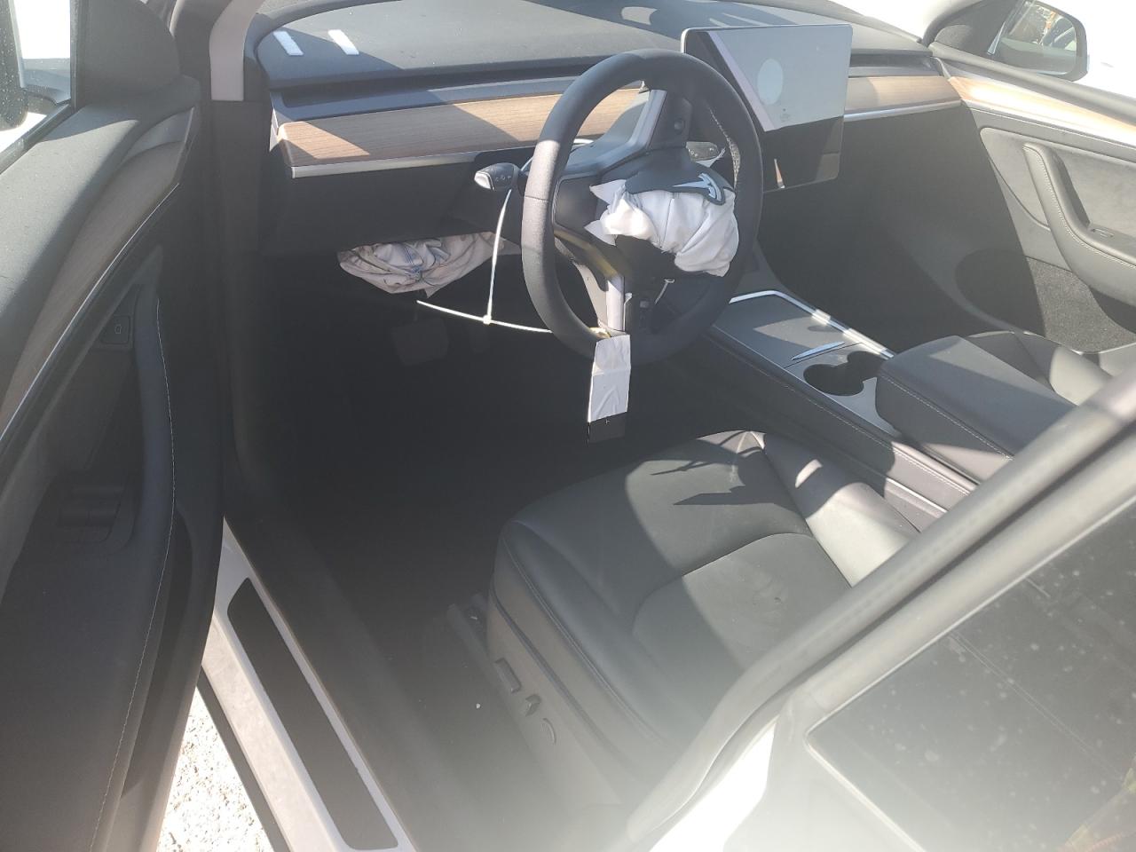 2023 Tesla Model Y VIN: 7SAYGDEE8PA035410 Lot: 61074624