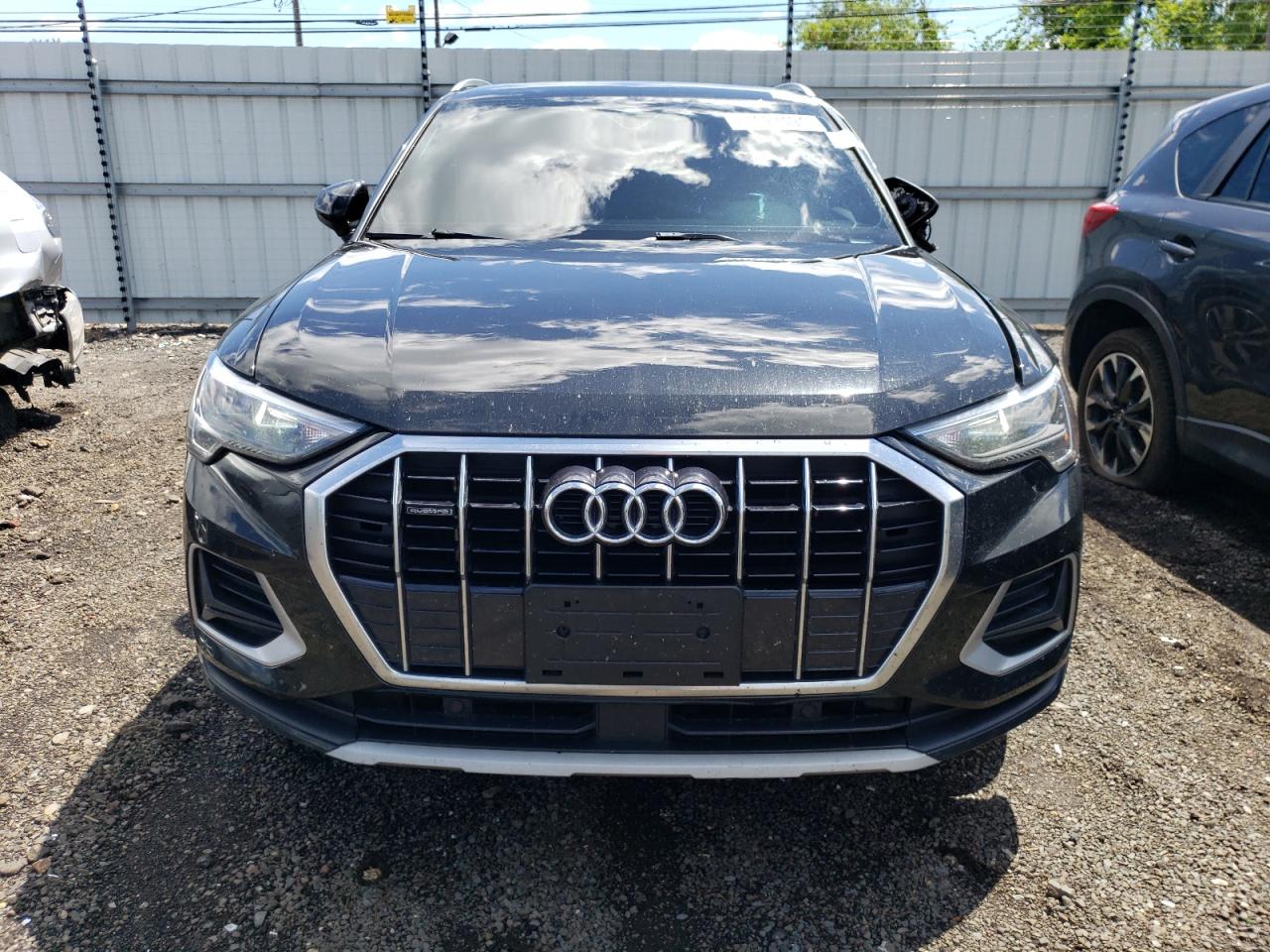 2020 Audi Q3 Premium VIN: WA1AECF31L1049273 Lot: 60927494