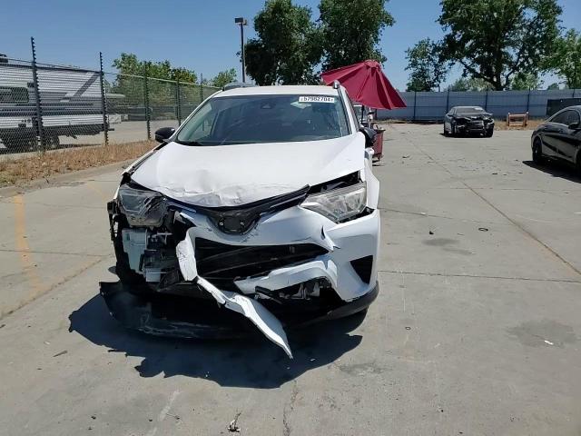 2018 Toyota Rav4 Le VIN: JTMZFREV0JD115772 Lot: 57982704