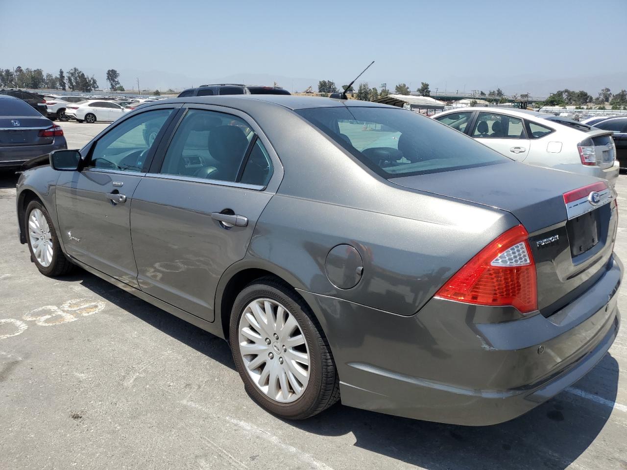 2011 Ford Fusion Hybrid VIN: 3FADP0L35BR129413 Lot: 59997024