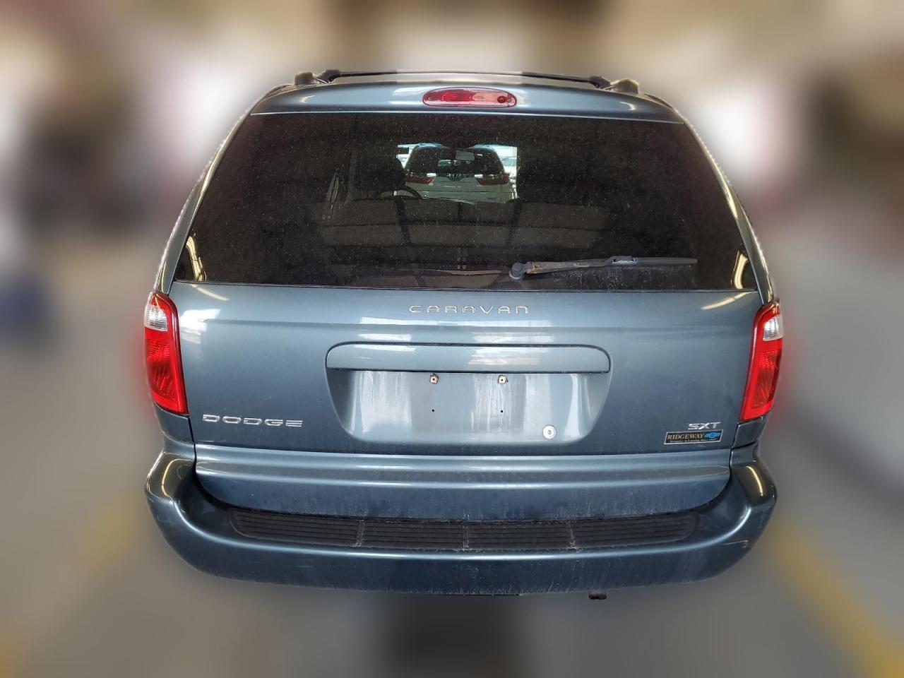 2005 Dodge Caravan Sxt VIN: 1D4GP45R25B238410 Lot: 59869134