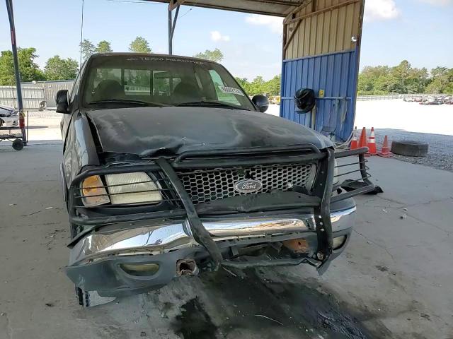 2000 Ford F150 VIN: 1FTRX18L8YNA88477 Lot: 60002124