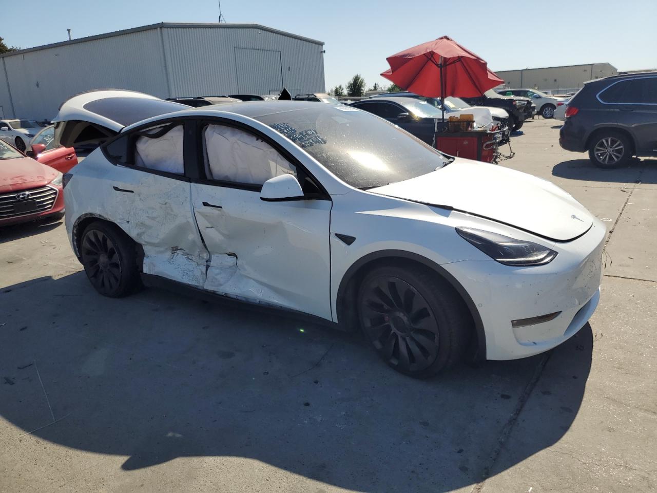 7SAYGDEF7NF340910 Tesla Model Y  4