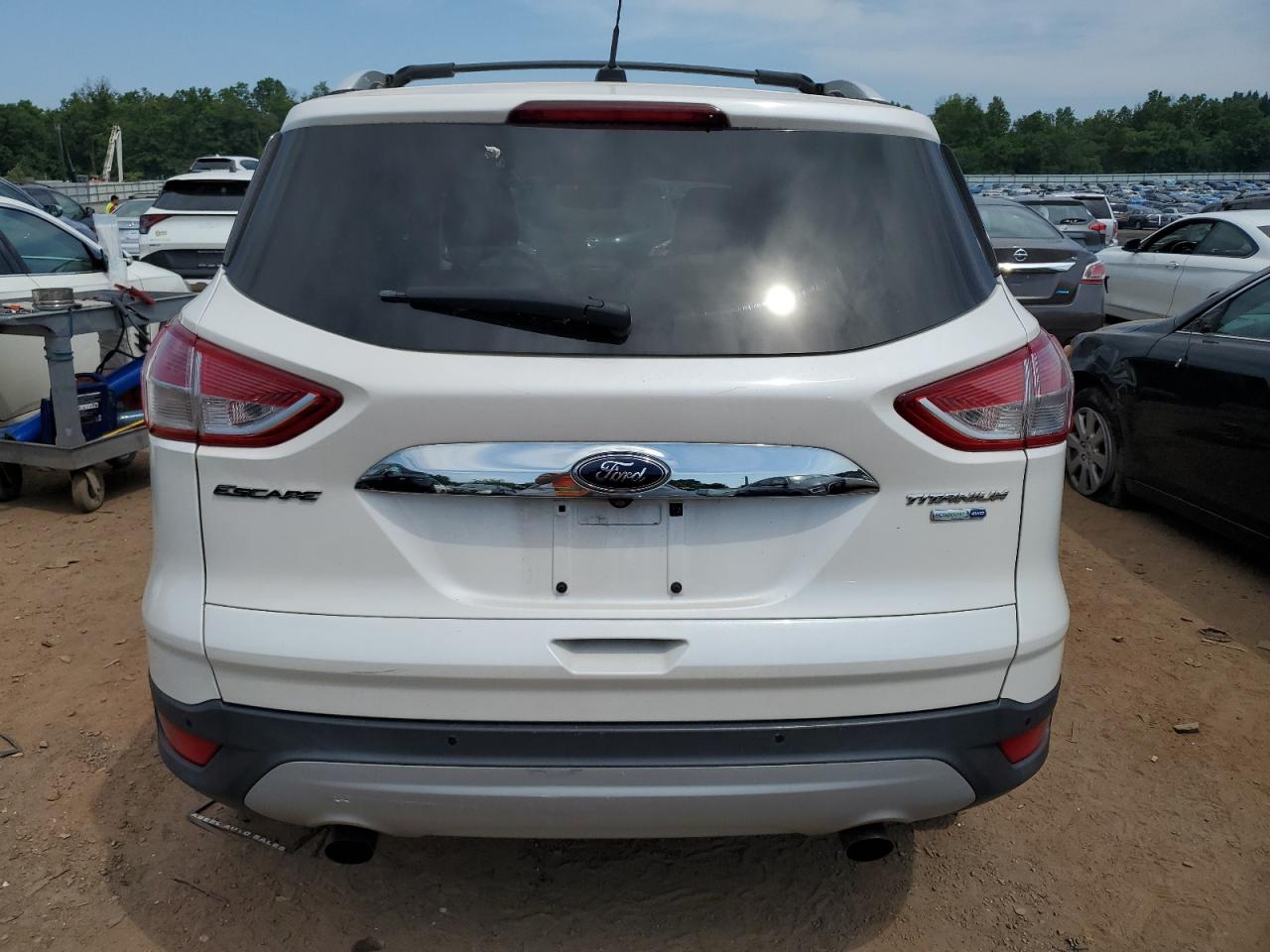 2014 Ford Escape Titanium VIN: 1FMCU9J98EUB11460 Lot: 59616704