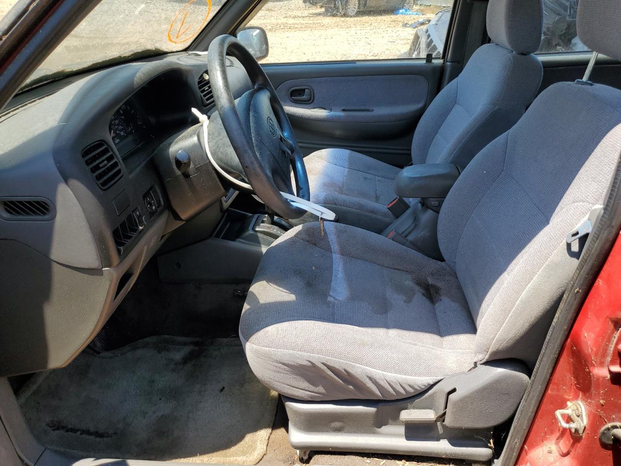 1999 Kia Sportage VIN: KNDJA7237X5597517 Lot: 82673504