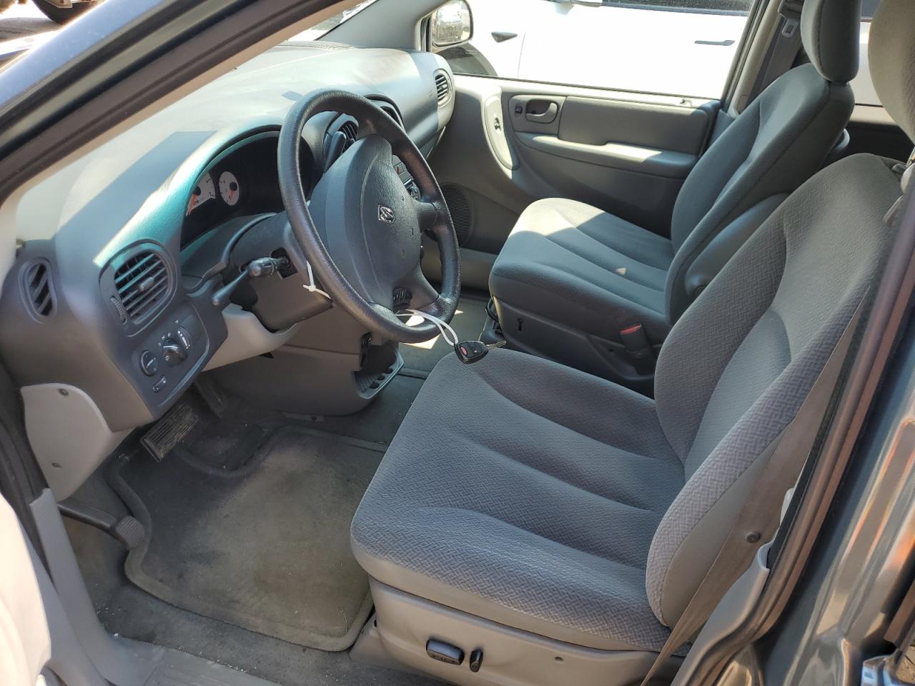 2005 Dodge Caravan Sxt VIN: 1D4GP45R25B238410 Lot: 59869134