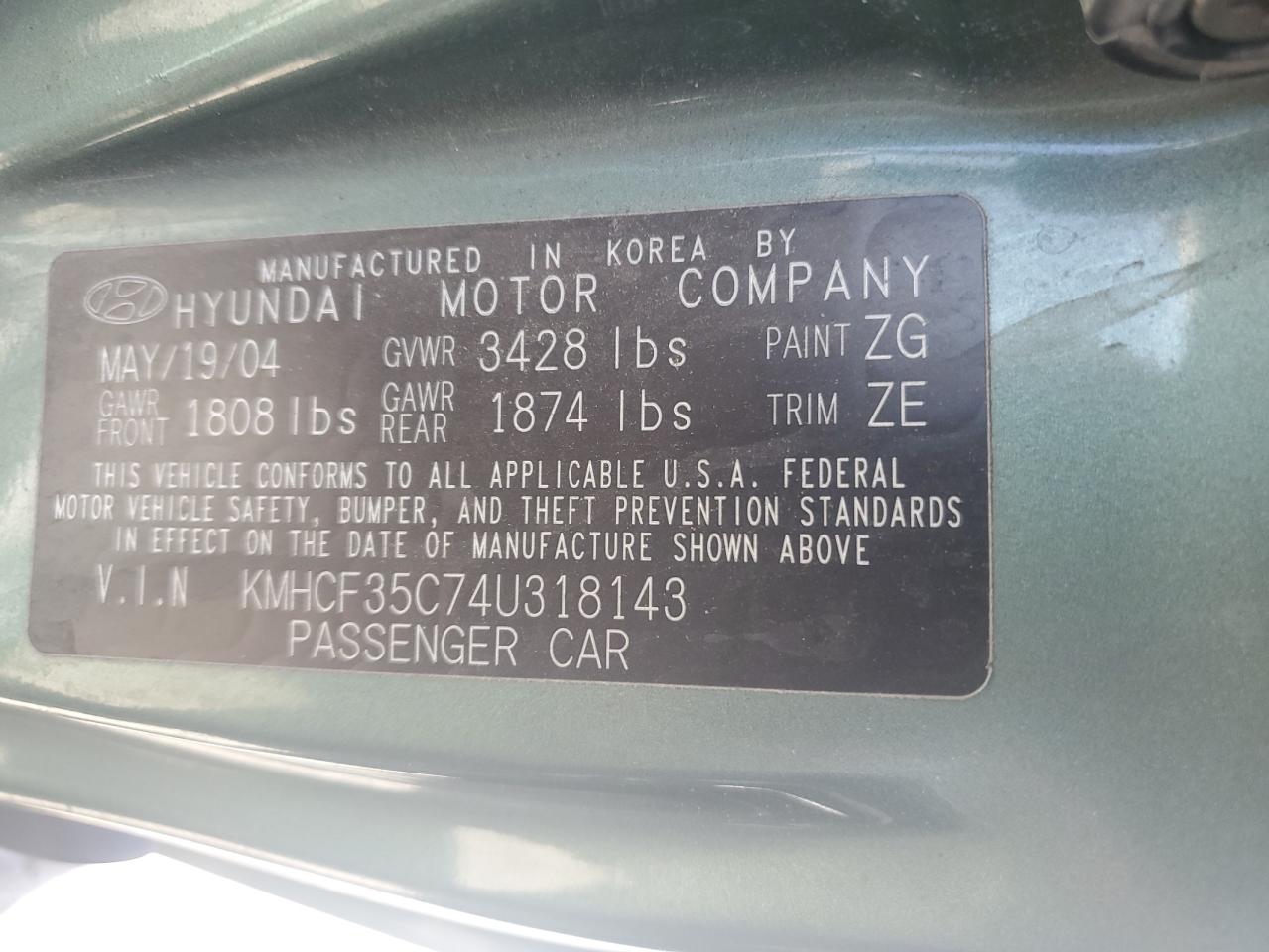 2004 Hyundai Accent L VIN: KMHCF35C74U318143 Lot: 59444534