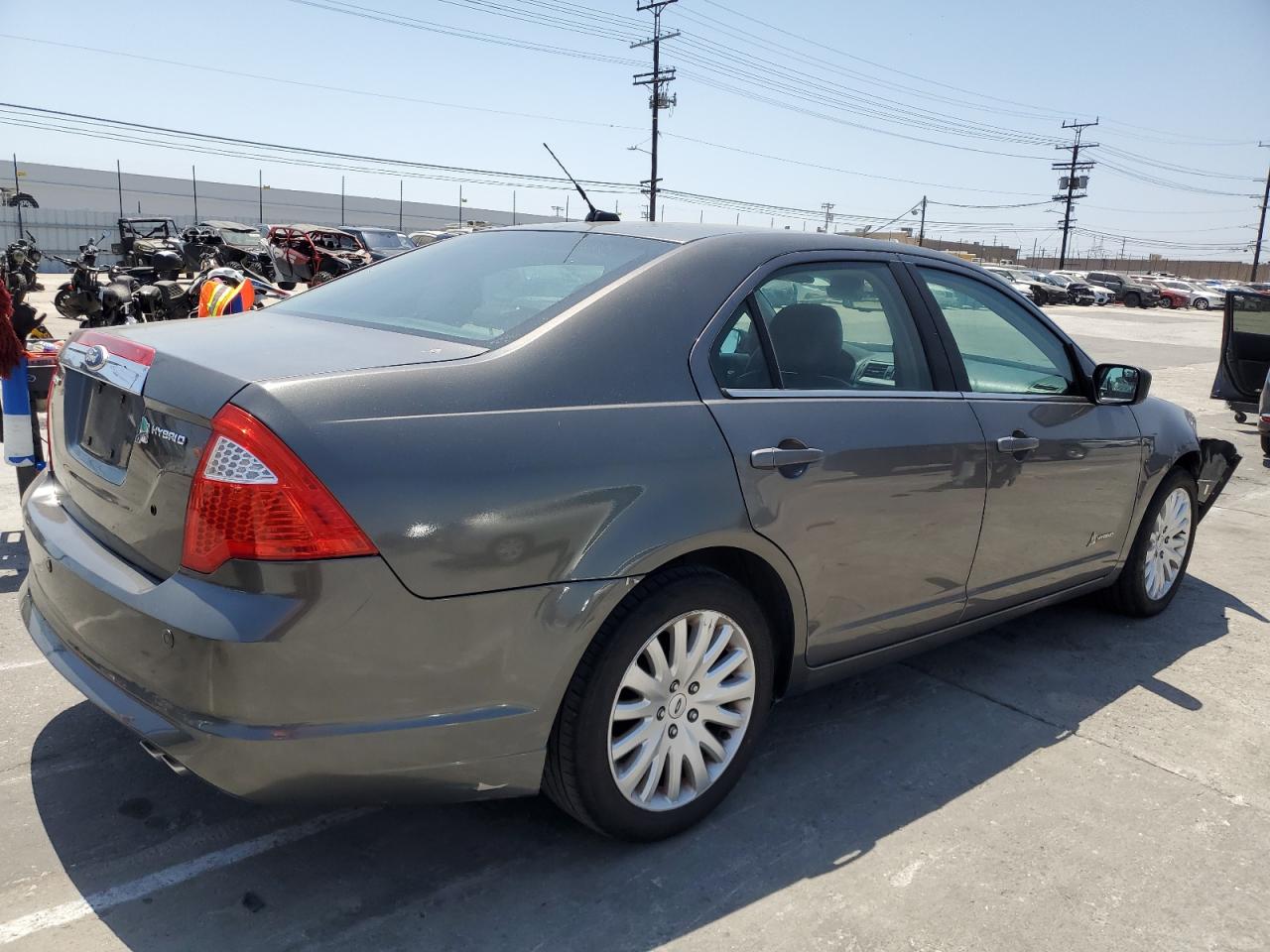 2011 Ford Fusion Hybrid VIN: 3FADP0L35BR129413 Lot: 59997024